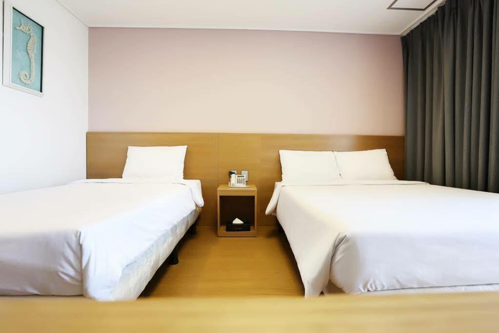 Sims Hotel Jeju Extérieur photo